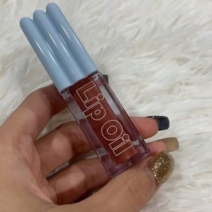 Kosas Wet Lip Oil Gloss in color “Dip”